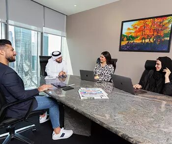 Clients meeting in a fully equipped boardroom with premium service and first-class IT at Servcorp Tornado Tower.